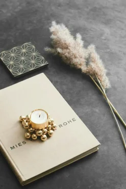 Molekyl Värmeljuslykta, Mässing